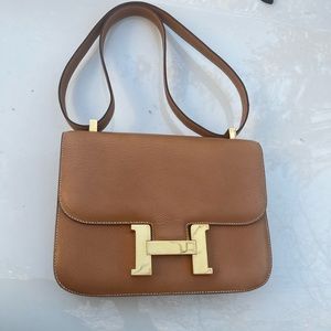 Vintage Hermes Constance 23. Courchevel leather. Hold with gold plated hardware.